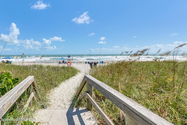 property view of water with a beach view