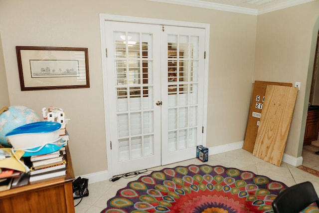 entryway featuring light tile floors, crown molding, and french doors