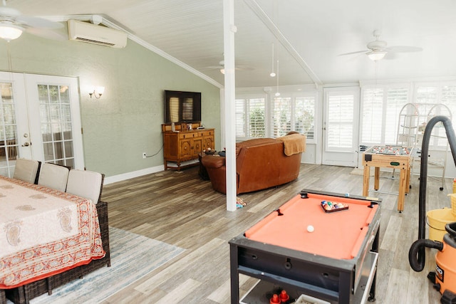 interior space with ceiling fan, lofted ceiling, light wood-type flooring, and billiards