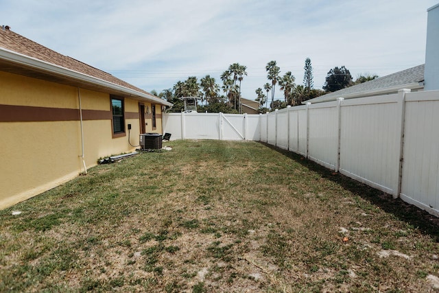 view of yard featuring central AC unit