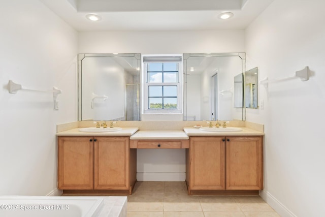 bathroom featuring tile patterned flooring and vanity