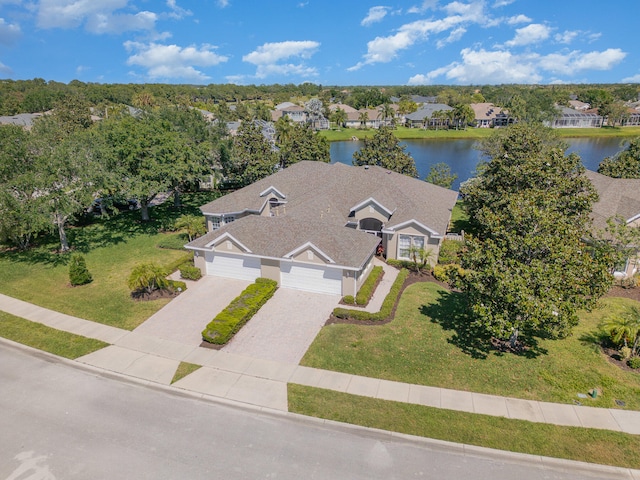 birds eye view of property featuring a water view