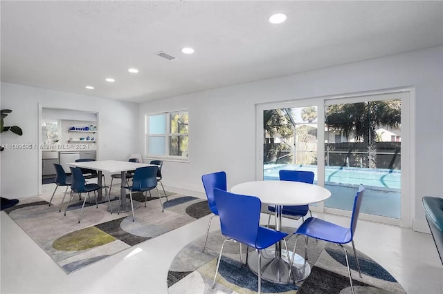 dining room featuring plenty of natural light