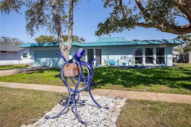 ranch-style home with a front lawn