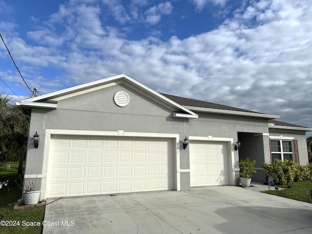 view of front of home featuring a garage