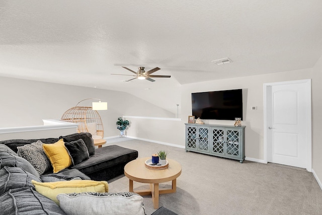 living room with light carpet, ceiling fan, and vaulted ceiling