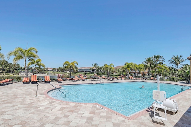 view of pool featuring a patio