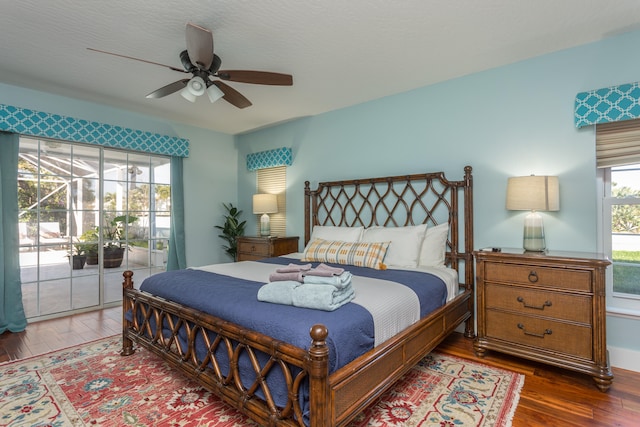 bedroom featuring ceiling fan, hardwood / wood-style flooring, and access to outside