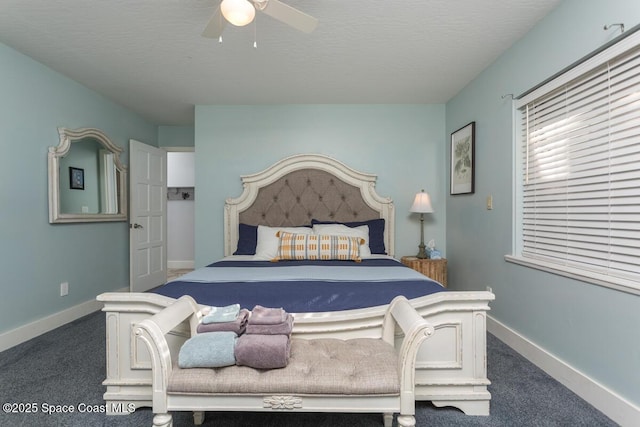 carpeted bedroom featuring a textured ceiling, ceiling fan, and baseboards