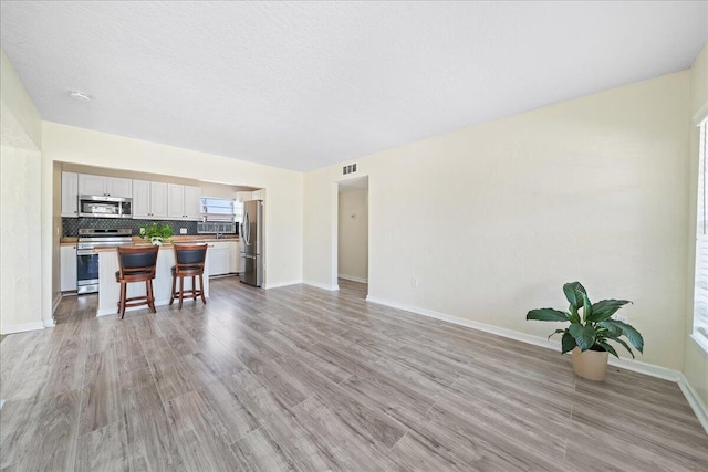 living room with light wood-type flooring