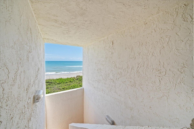 interior space featuring a view of the beach