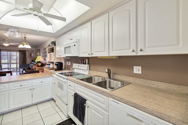 kitchen featuring white cabinets, white appliances, ceiling fan, and sink