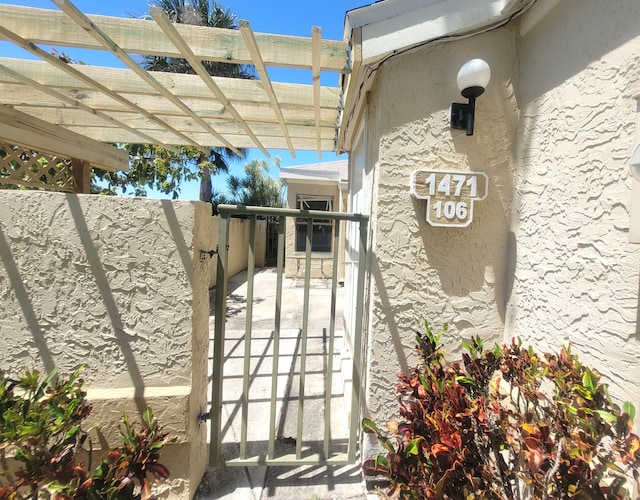 exterior space featuring a pergola