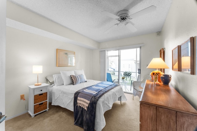 carpeted bedroom with a textured ceiling, ceiling fan, and access to exterior