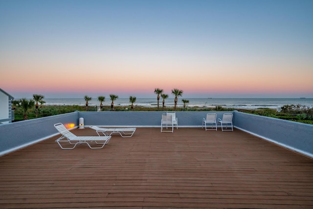 deck at dusk with a water view