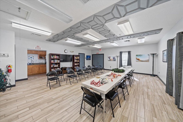 interior space featuring light hardwood / wood-style flooring and sink