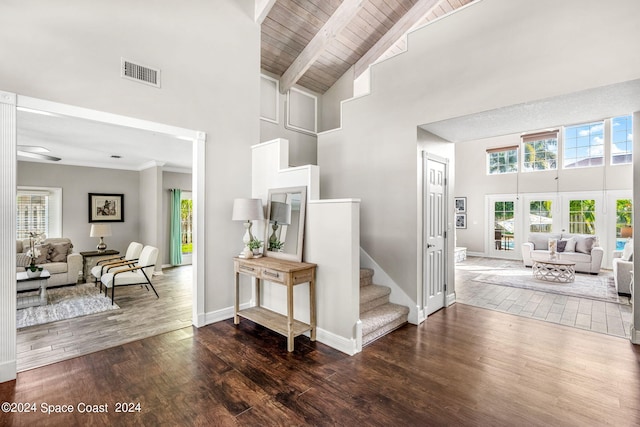 interior space featuring wooden ceiling, high vaulted ceiling, french doors, beamed ceiling, and wood-type flooring