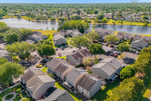 bird's eye view with a water view and a residential view