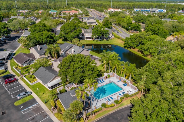 aerial view featuring a water view and a residential view