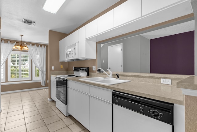 kitchen featuring sink, white appliances, light tile flooring, white cabinetry, and an inviting chandelier