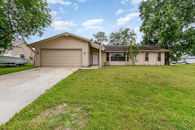 ranch-style house with a garage and a front lawn