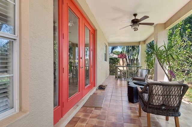 exterior space with french doors and ceiling fan