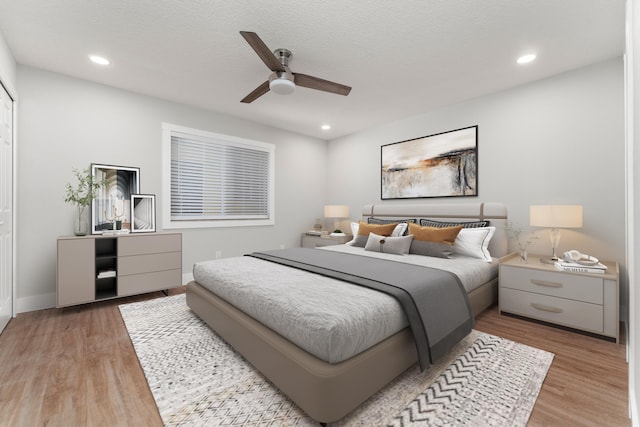 bedroom featuring ceiling fan and hardwood / wood-style floors