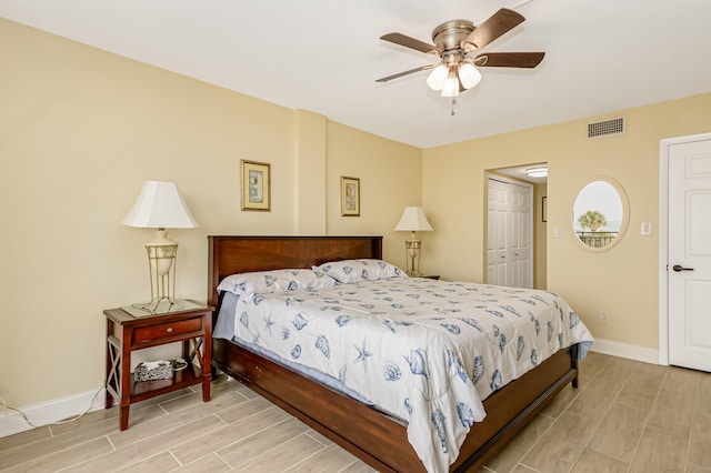 bedroom featuring a closet, ceiling fan, and hardwood / wood-style flooring