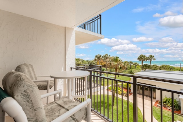 balcony featuring a water view