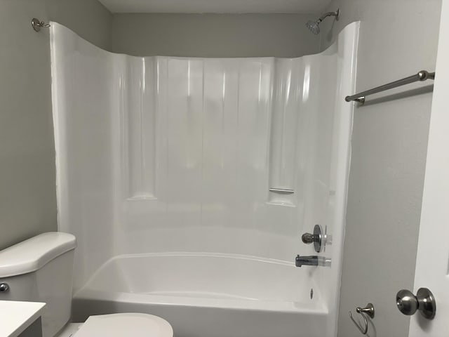 full bathroom featuring toilet, vanity, and shower / tub combination