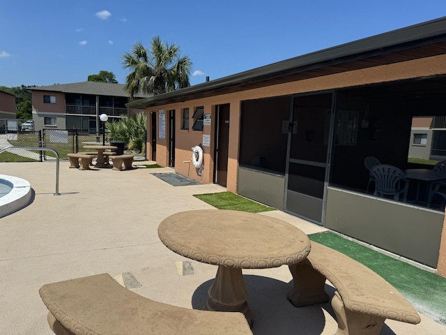 surrounding community featuring a patio area