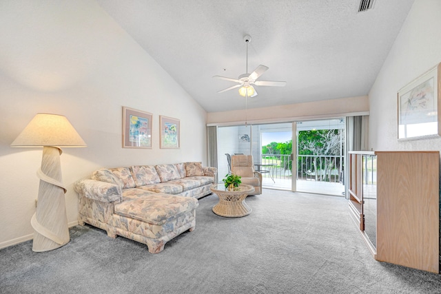 living room with high vaulted ceiling, ceiling fan, and carpet floors