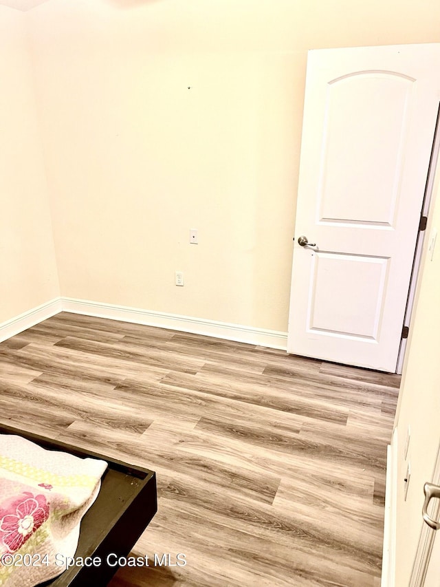 empty room featuring hardwood / wood-style floors