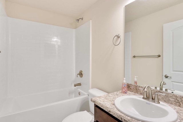 full bathroom with toilet, vanity, and tub / shower combination