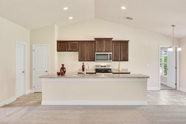 kitchen with light carpet, stainless steel appliances, light stone counters, and sink