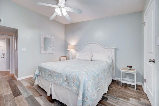 bedroom featuring ceiling fan and light hardwood / wood-style floors