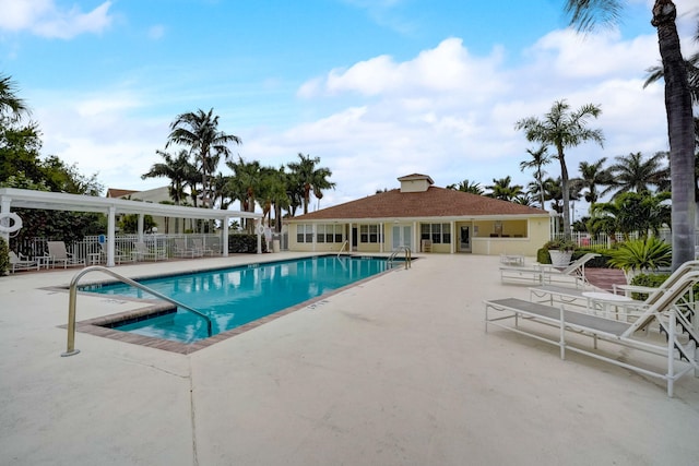 view of swimming pool with a patio