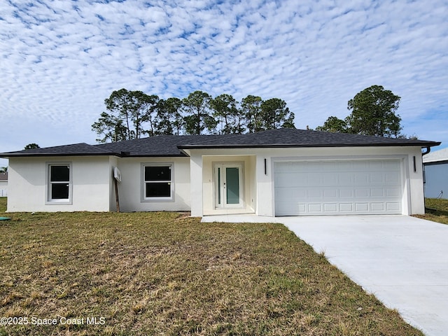 ranch-style home featuring a garage and a front yard