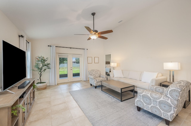 living room featuring light tile patterned floors, french doors, high vaulted ceiling, and ceiling fan