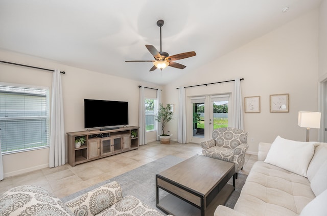 living room featuring ceiling fan, light tile patterned floors, high vaulted ceiling, and french doors