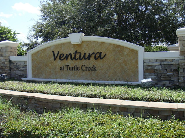 view of community sign