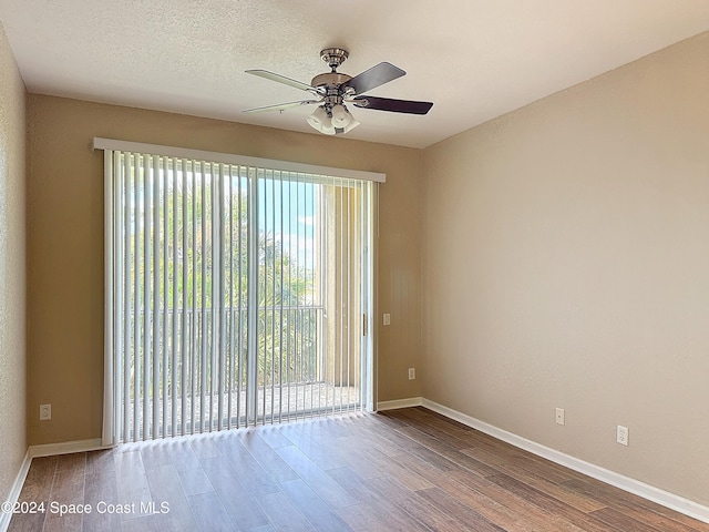 unfurnished room with hardwood / wood-style floors, a textured ceiling, and ceiling fan