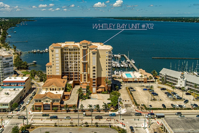 drone / aerial view with a water view