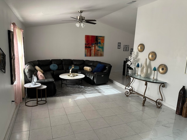 tiled living room featuring ceiling fan and lofted ceiling