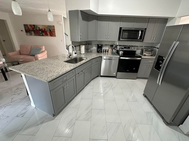 kitchen featuring light stone counters, kitchen peninsula, stainless steel appliances, light tile floors, and sink