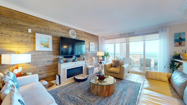 tiled living room with a water view, wood walls, and ornamental molding