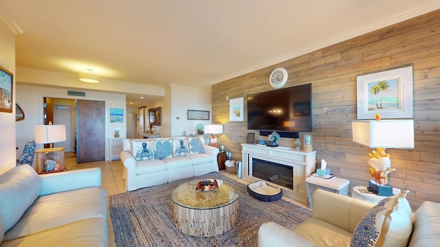 living room featuring tile flooring, crown molding, and wooden walls