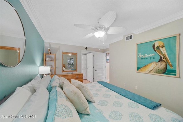 bedroom featuring ceiling fan and ornamental molding