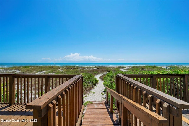 deck featuring a water view