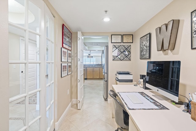 office area featuring french doors and light tile flooring